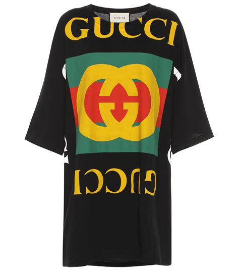 gucci top with gucci writen all over